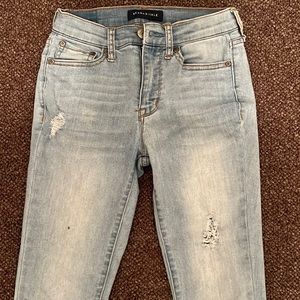 Light blue high waisted jeggings with rips and marks size 00r